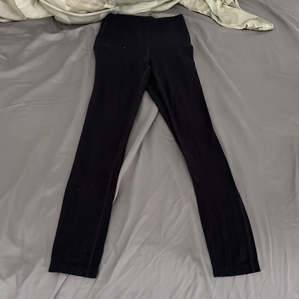 Splits59 leggings made for Pure Barre. Black with design pattern w/ P circle XS